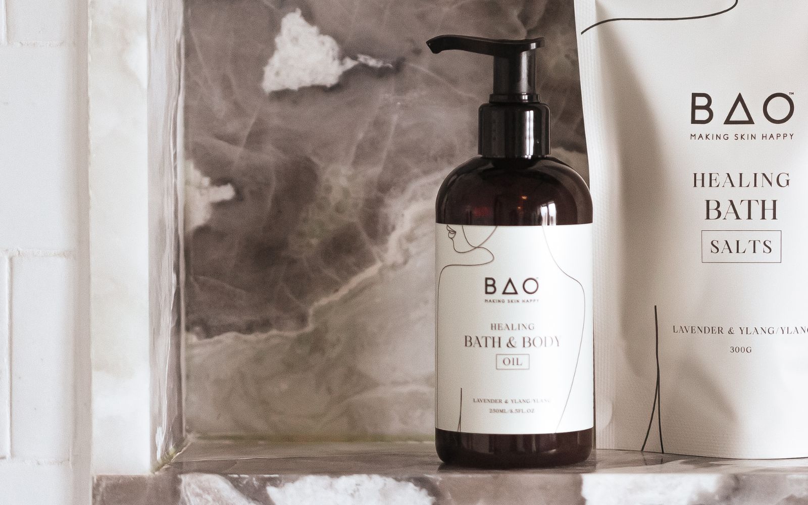 BAO bath and body oil and bath salts in a shower