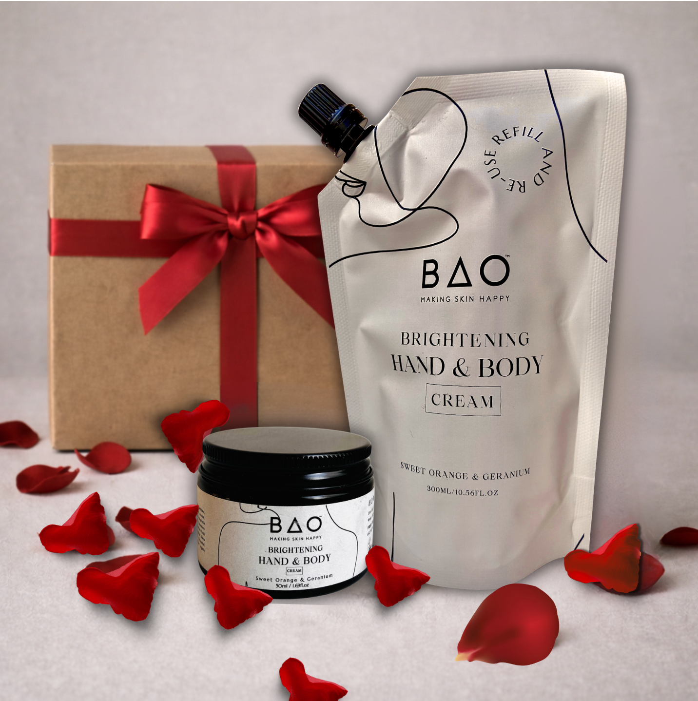 BAO brightening hand and body cream packaging with a gift box and red ribbons on a light background.