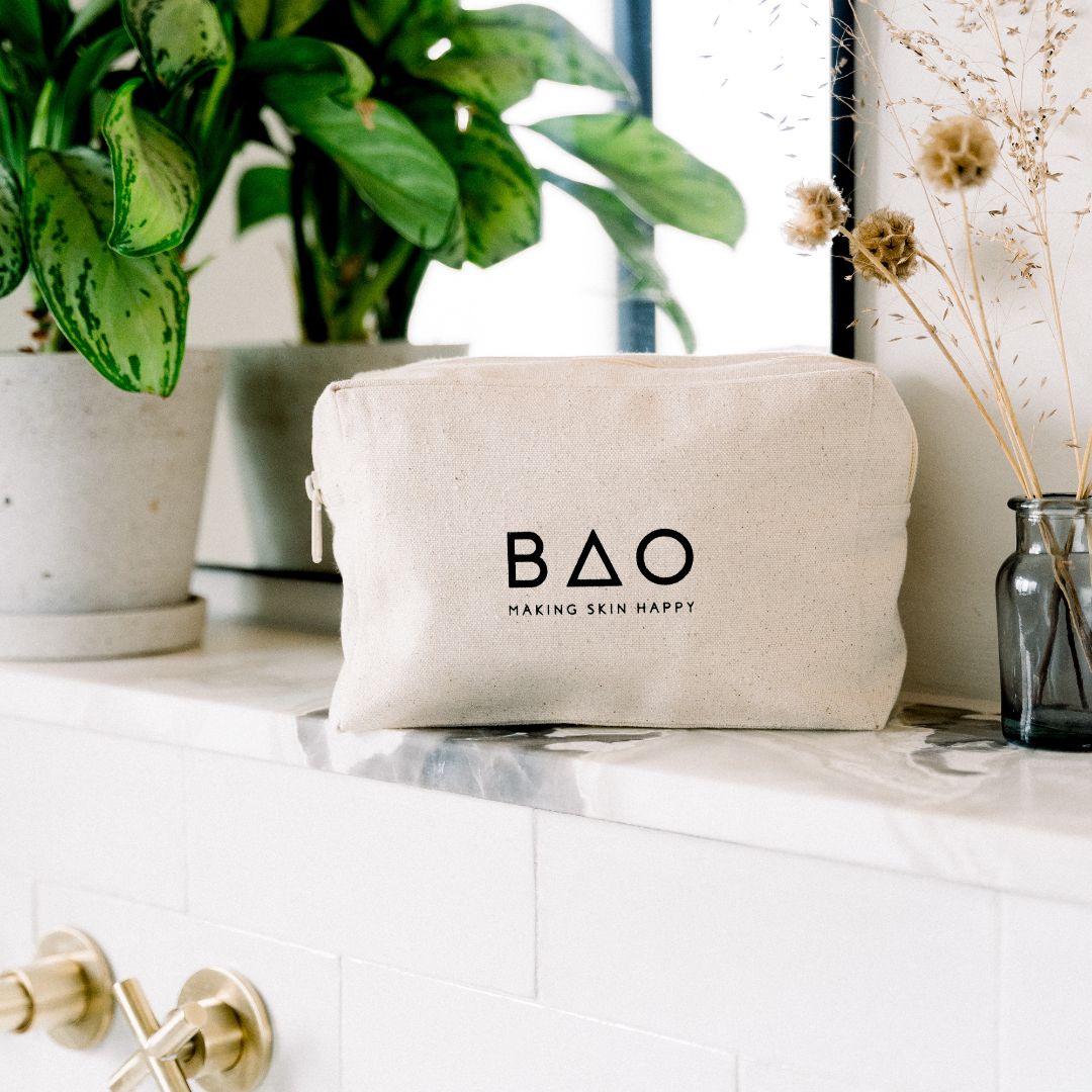 BAO canvas gift bag displayed on a windowsill with plants
