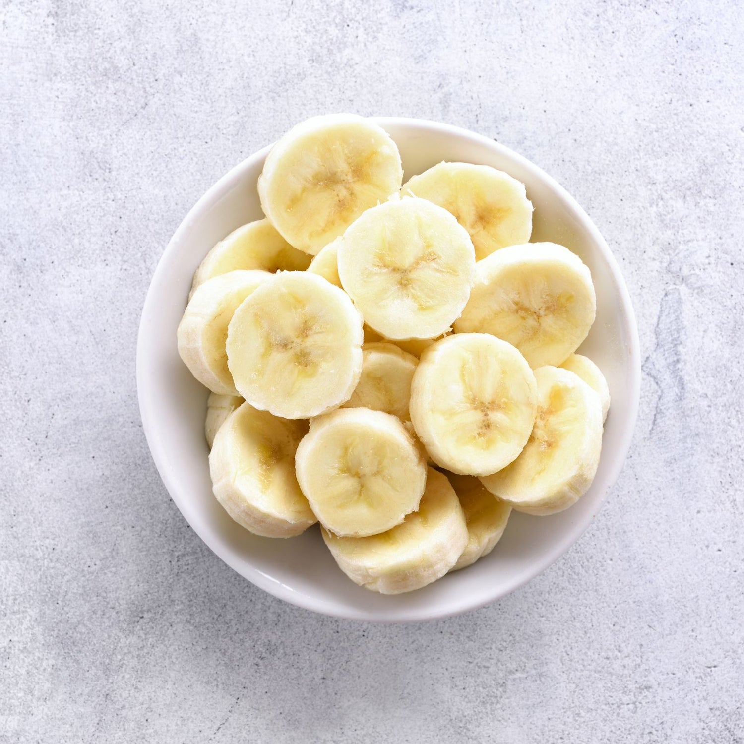 Organic chopped bananas in a bowl