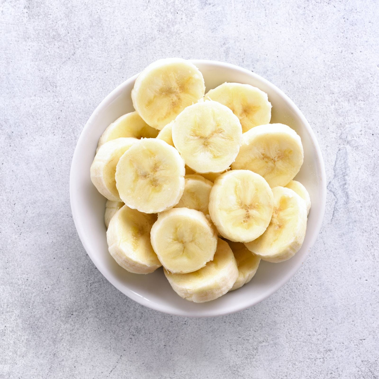 Organic chopped bananas in a bowl