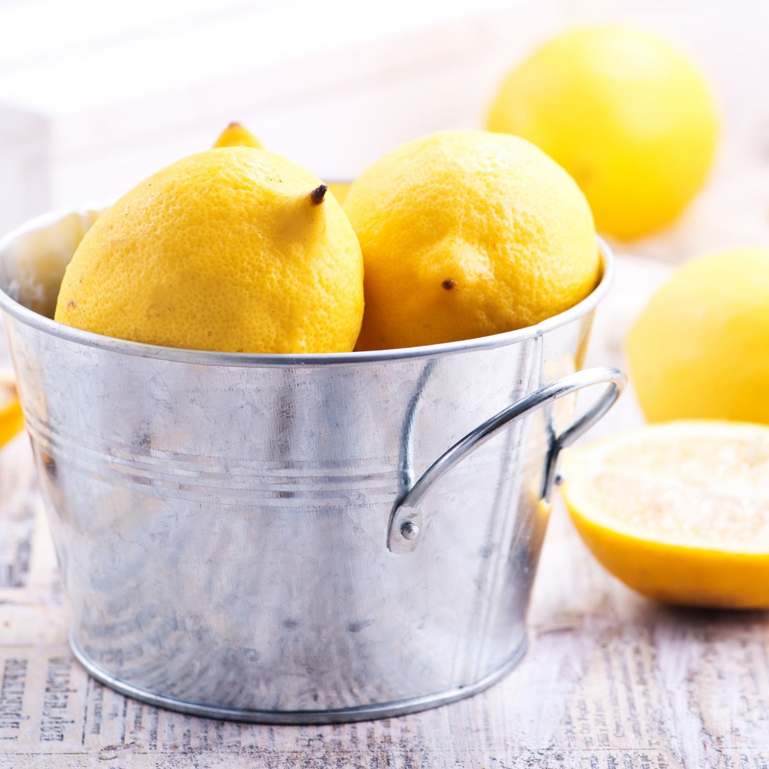 Organic lemons in a metal bucket