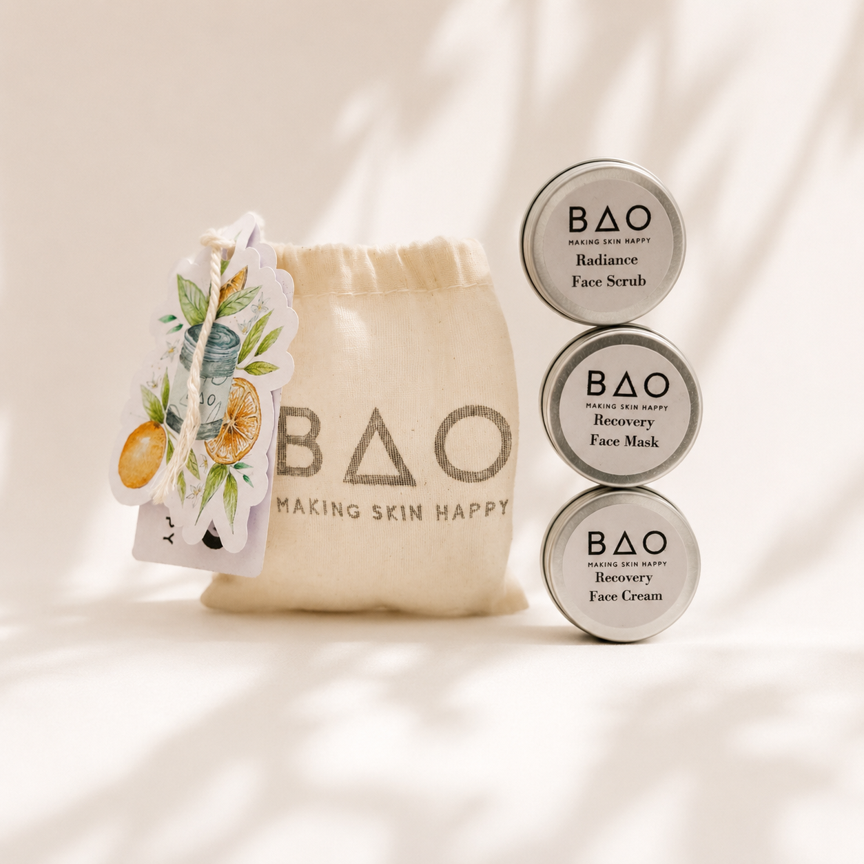 BAO skincare products including face serum, mask, and cream with a branded pouch on a light background.