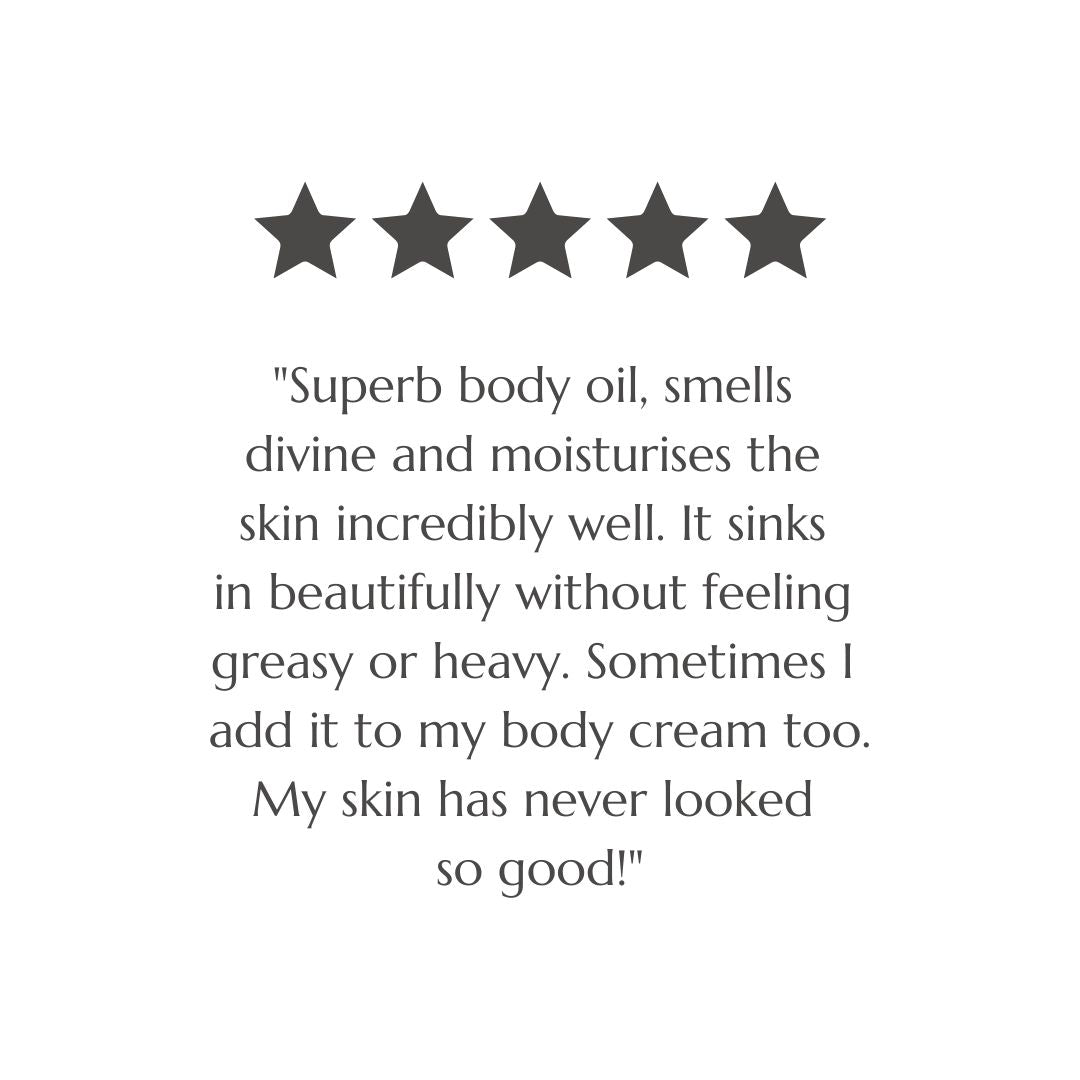 Customer review screenshot praising BAO Healing Bath &amp; Body Oil for its scent and moisture