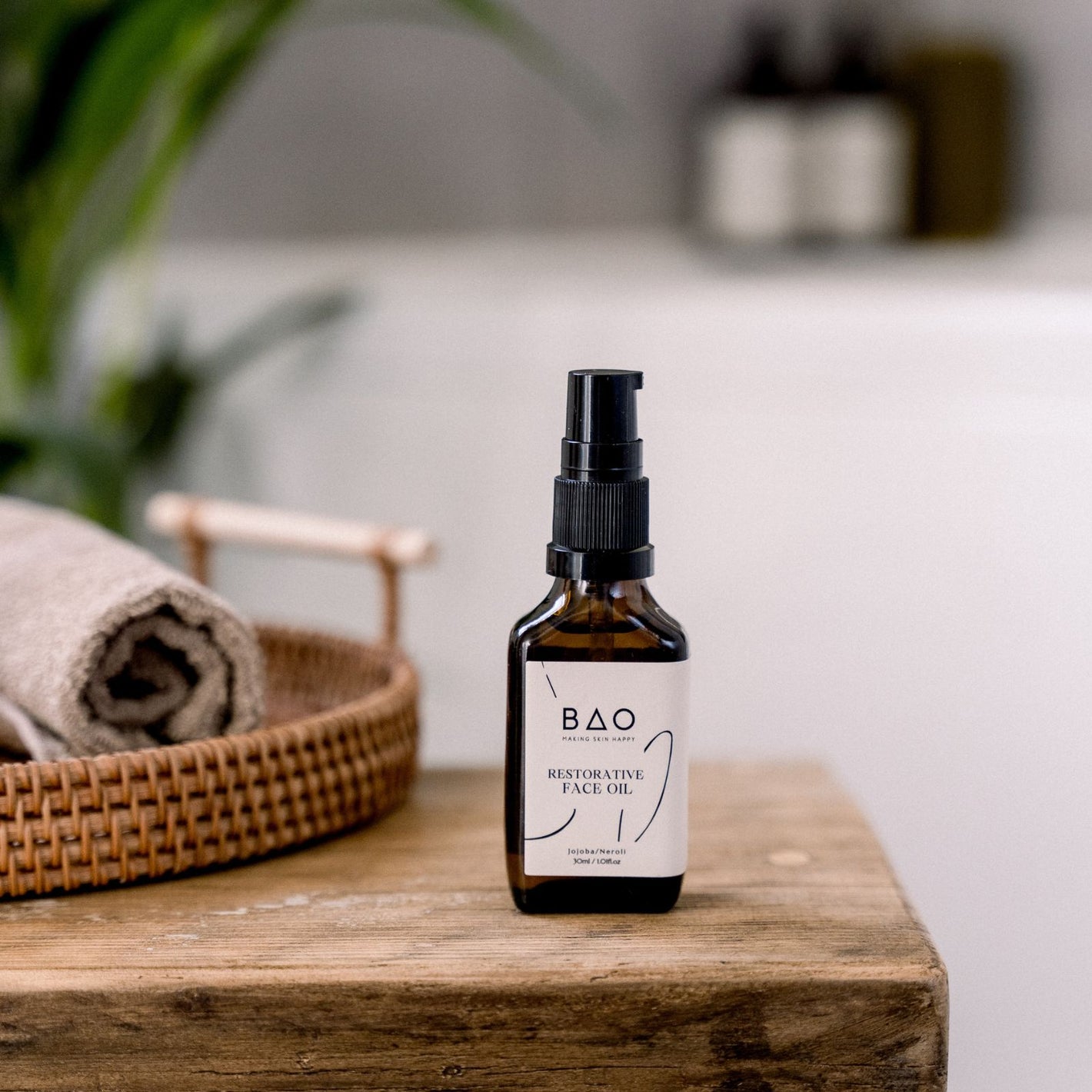 Organic facial oil on a wooden stool.