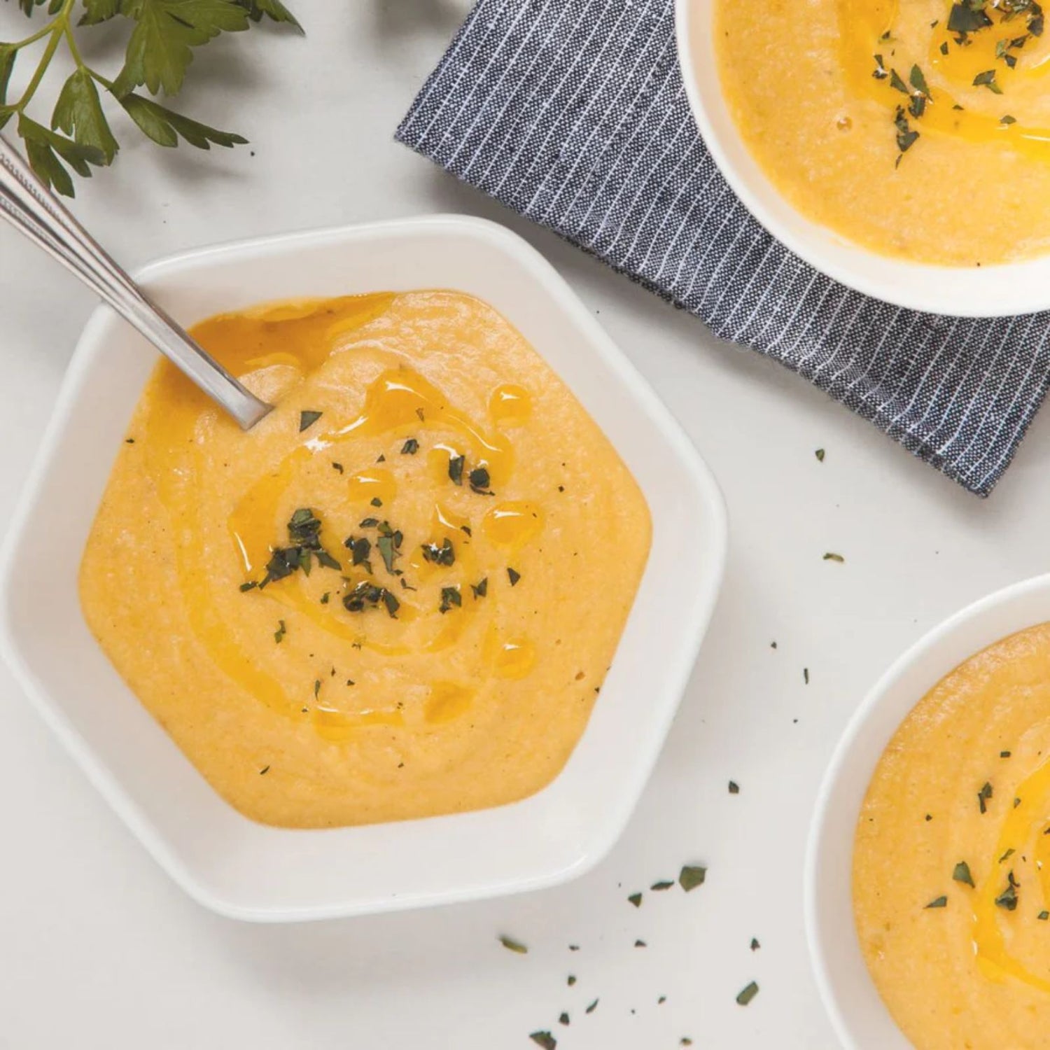 Winter squash soup in a china bowl